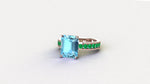 3.09 carats blue natural Aquamarine ring in 18k Rose gold and green Emerald pave'
