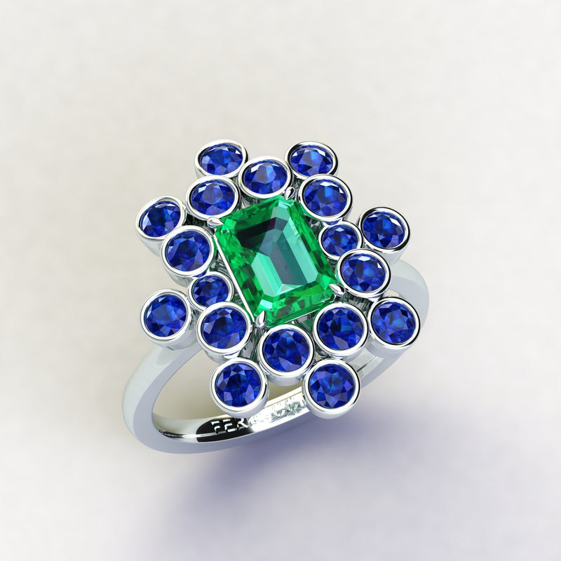 1.5 carats Colombian Emerald and Blue Sapphires cluster Platinum ring
