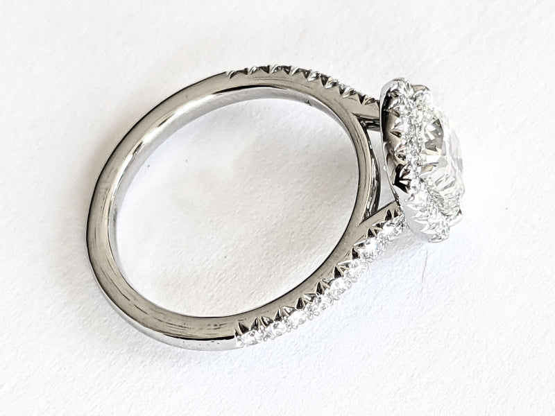 1.5 carats Cushion Diamond GIA Certified with Halo and Pavé Diamond Setting in Platinum 950