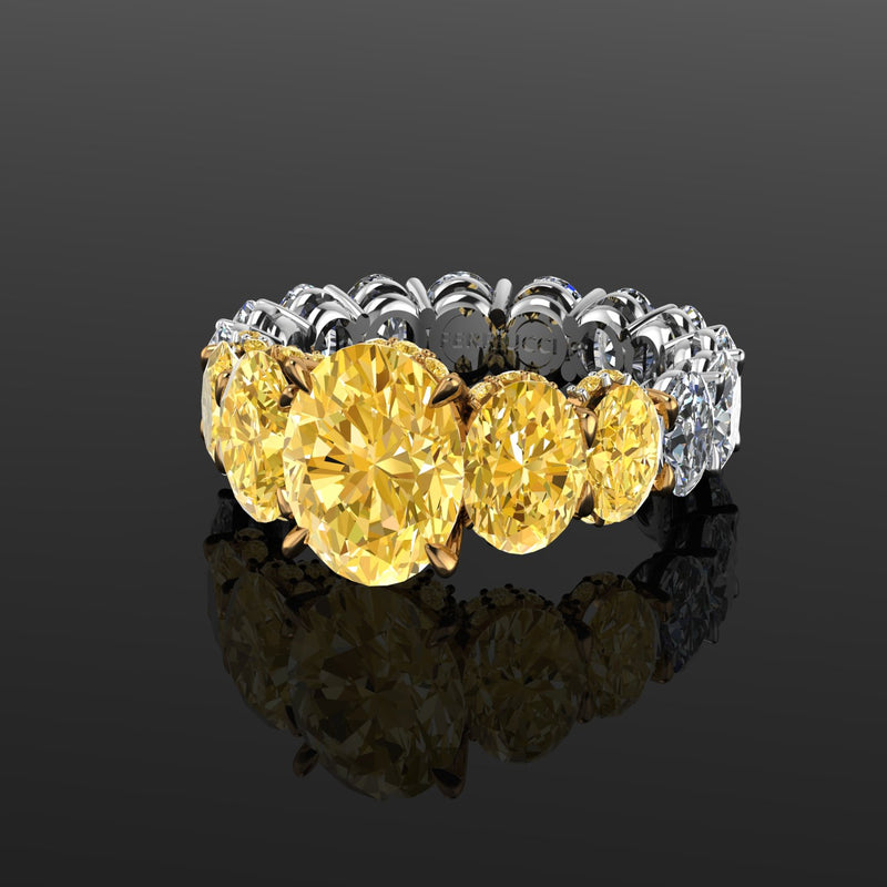 GIA 6.18 Carat Oval Yellow Intense Diamonds 18 Karat Shank Platinum 950 Ring