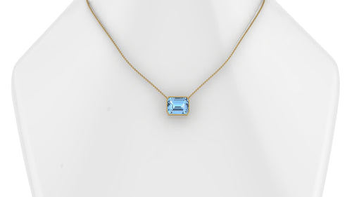 10.39 Carat Emerald cut Aquamarine in 18K Gold thin bezel Necklace Pendant